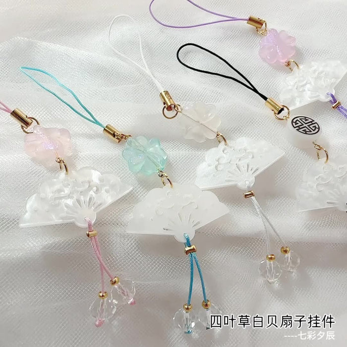 Wholesale Clover white shell fan mobile phone chain pendant bag pendant
