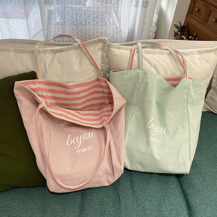 Wholesale Striped canvas bag, casual large capacity, reversible single shoulder tote bag, commuting bag