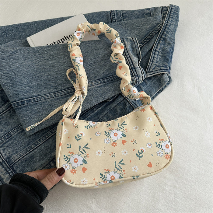 Wholesale Versatile pleated handbag, fashionable flower shoulder bag