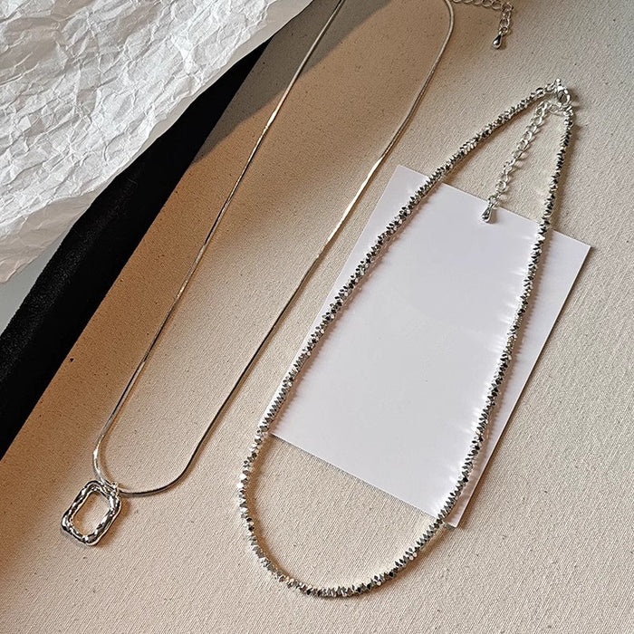 Wholesale Double layered necklace with light luxury and niche hollow block design, exquisite silver plated collarbone chain