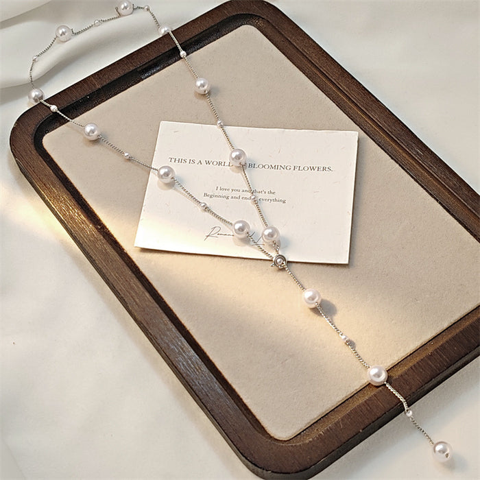 Wholesale New light luxury fashion Y-shaped pearl necklace with high-end temperament sweater chain versatile and niche design accessory