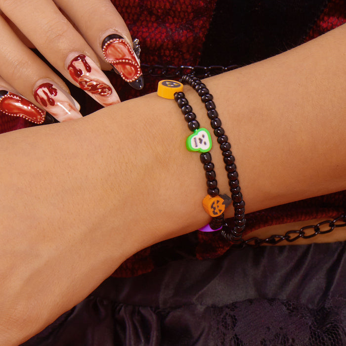 Wholesale  bracelet rice bead orange pumpkin skull pendant jewelry set