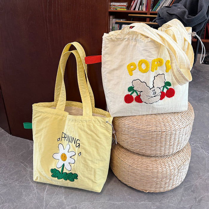 Wholesale New cartoon embroidery drawstring shoulder bag, casual canvas bag, large capacity commuting bag