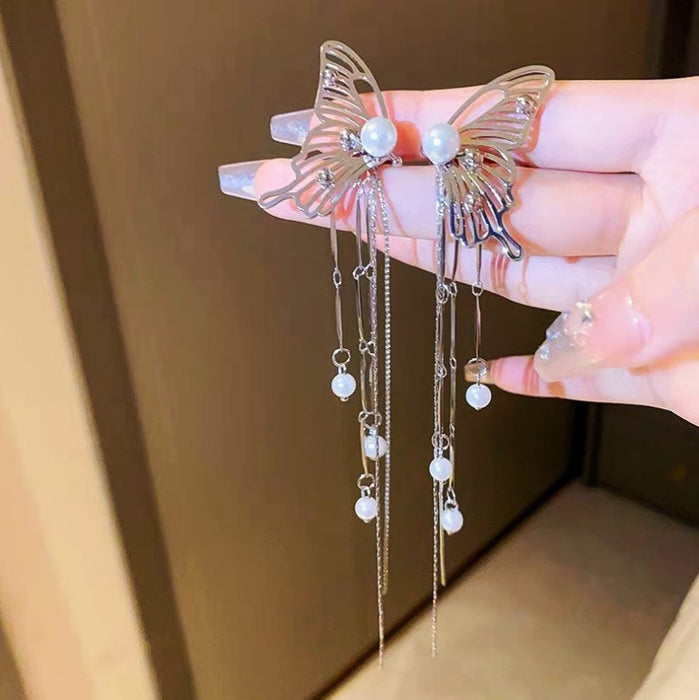 Wholesale Hollow out butterfly earrings, new trendy style, pearl tassel ear bone clip, high-end feeling, light luxury earrings