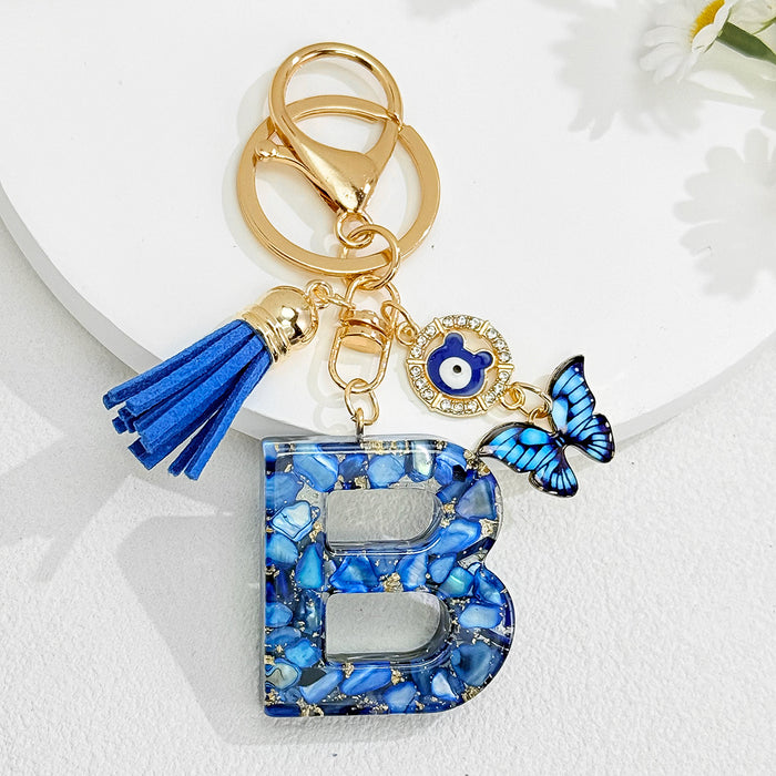 Wholesale Royal Blue 26 Letter Keychain with Evil Eye Butterfly Tassel Pendant