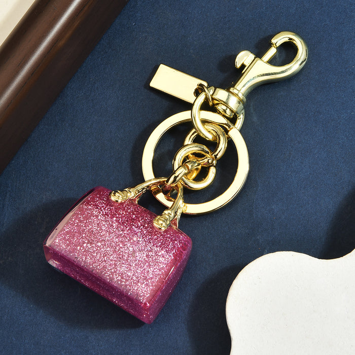 Wholesale Chic Letter C Bag Charm Keychain Red Alloy Electroplated Women S Purse Pendant Gift Resale