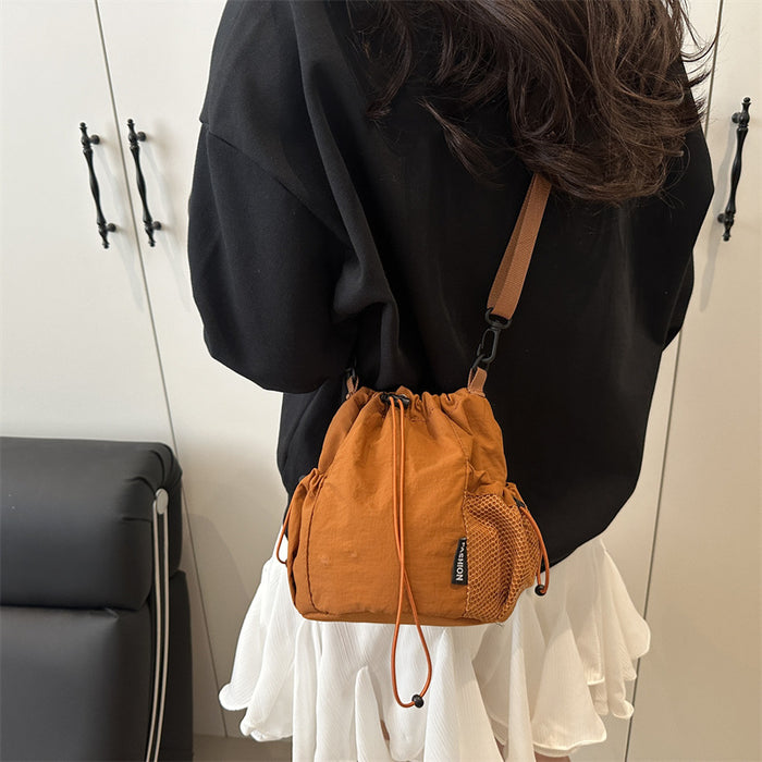 Wholesale Small niche design drawstring bucket bag, outdoor sports, leisure, fashion, versatile nylon crossbody bag