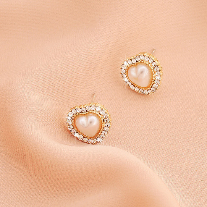 Wholesale Silver needle heart-shaped pearl earrings, light luxury earrings, retro temperament, niche design sense