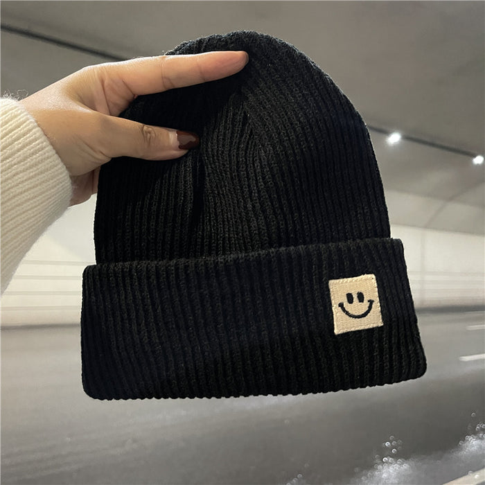 Wholesale Autumn and Winter Cute Smiley Face Logo Wool Knitted Hat JDC-FH-Yizhan002