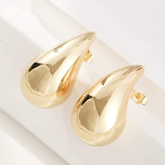 Wholesale Fashionable and high-end gold water droplet hollow earrings sell well, niche design earrings, temperament earrings