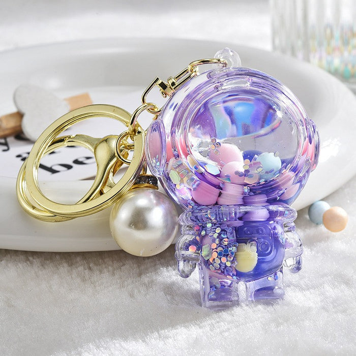 Wholesale Acrylic oil bottle candy Bean astronaut keychain