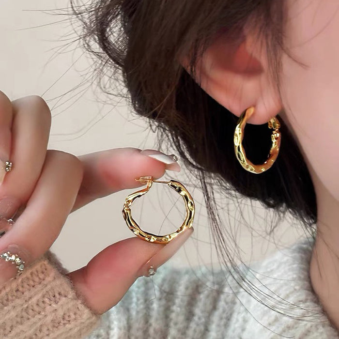 Wholesale Gold ring earrings with a high-end feel, niche pure silver earrings, temperament, and circle earrings