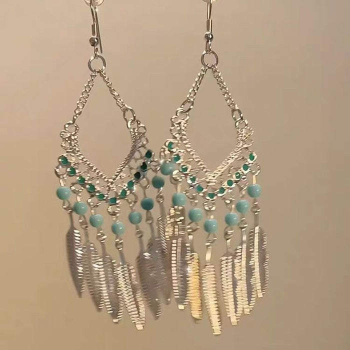 Wholesale Feather long tassel earrings with retro and niche design, fashionable and exquisite ear hooks