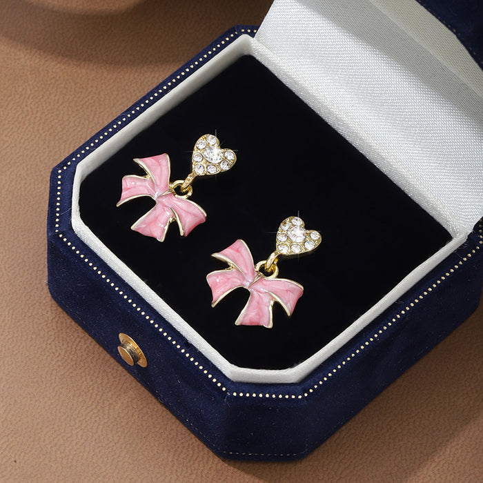 Wholesale Bow painted oil earrings set with diamonds, high-end earrings