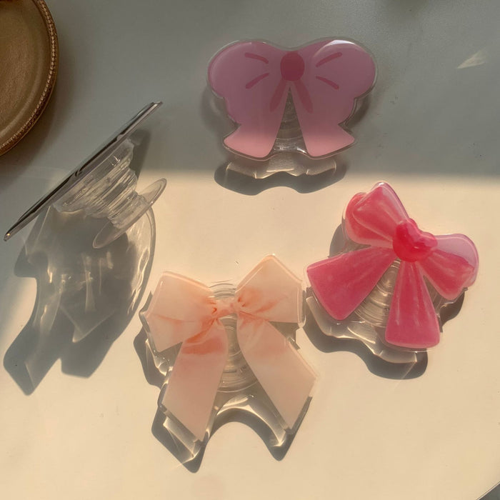 Wholesale Bow-shaped phone holder suitable for any 3m airbag phone holder Grips