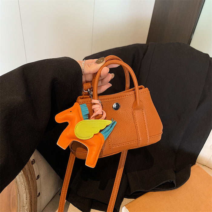 Wholesale Children's bag with high-end lychee pattern mini garden bag, girls' parent-child fashion show crossbody bag