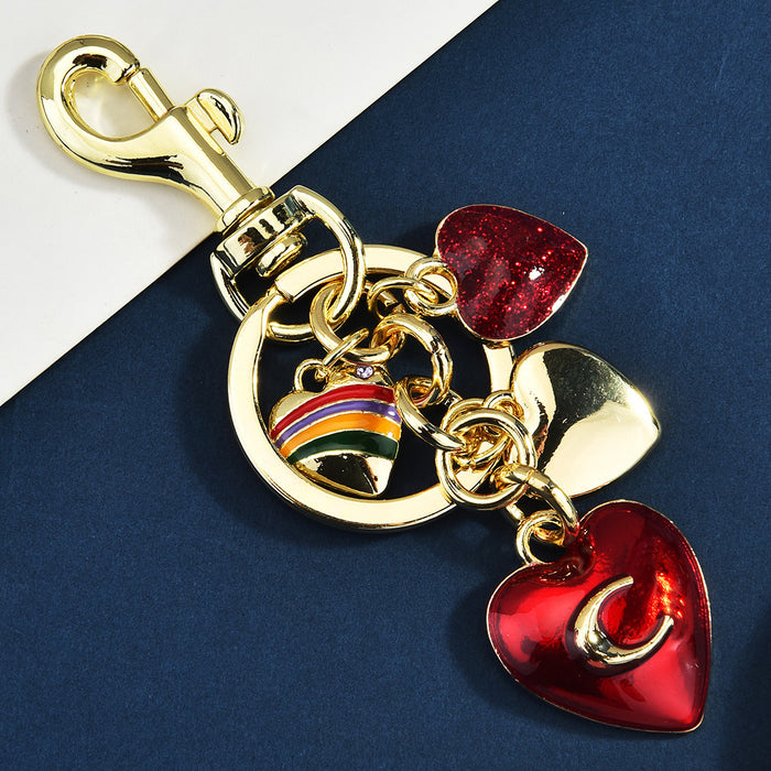 Wholesale Stylish Metal Bag Charm Keychain With Fruit Pattern And Alphabet Pendant For Car Keys And Bags