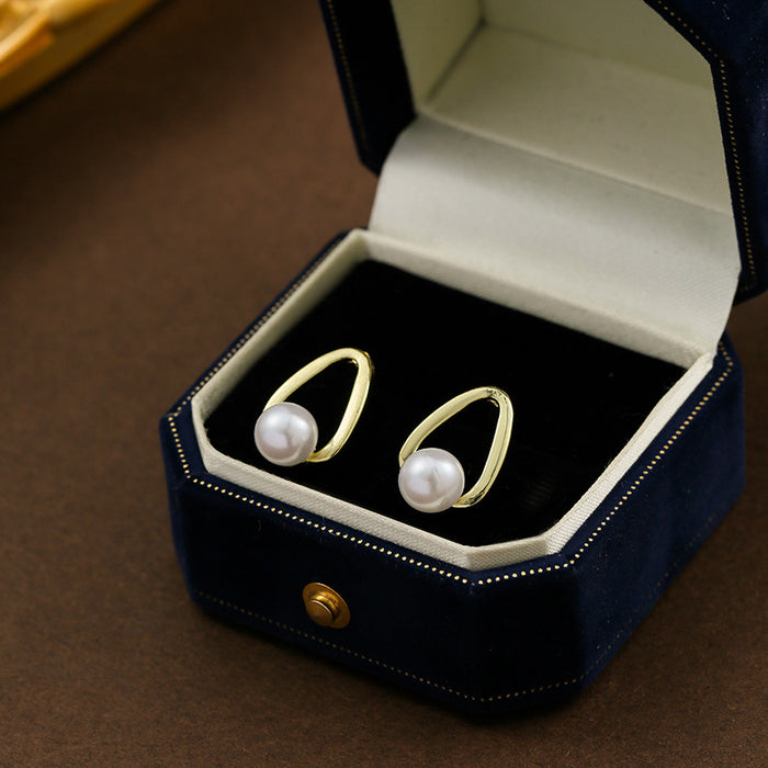 Wholesale Silver needle pearl earrings with simple and niche design, light luxury temperament, earring accessories