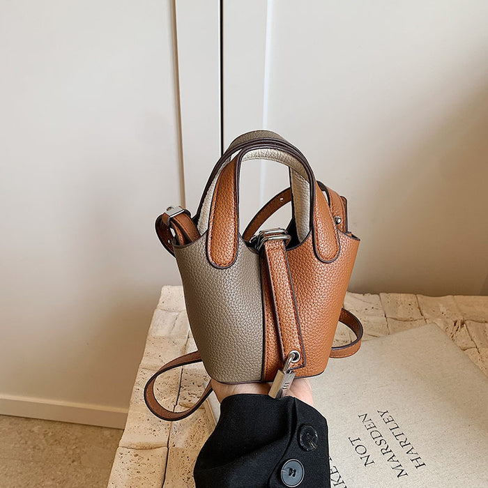 Wholesale Children's bag, high-end color blocked mini bucket bag, hand-held bucket bag, crossbody bag