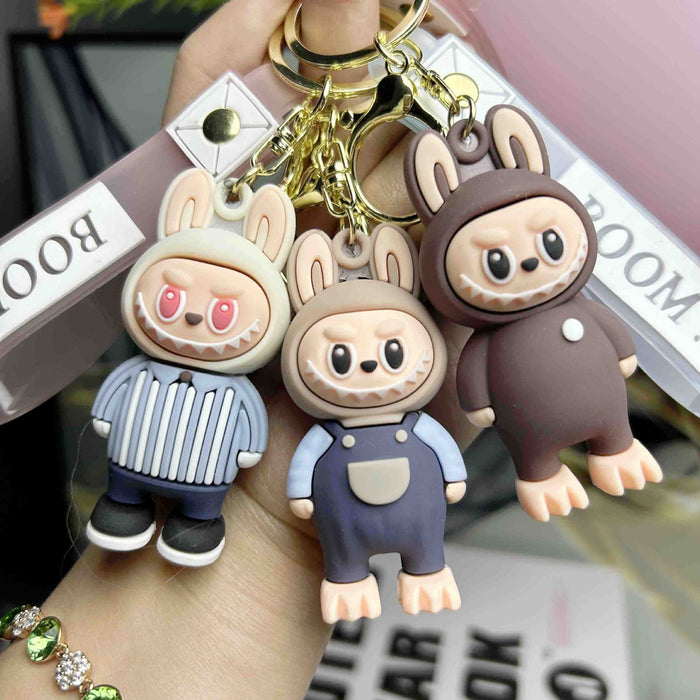Wholesale Cartoon soft plastic cute little monster keychain pendant small gift ornaments,  back to school season