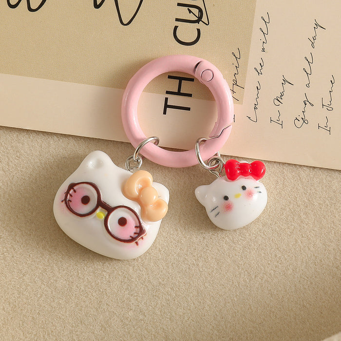 Wholesale Cartoon Cat With Bow And Glasses Resin Keychain Pendant Chic Decorative Accessory