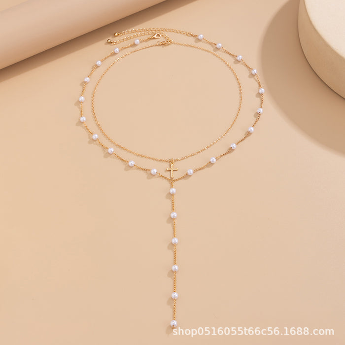 Wholesale Temperament imitation pearl chain long tassel necklace simple cross pendant collarbone chain