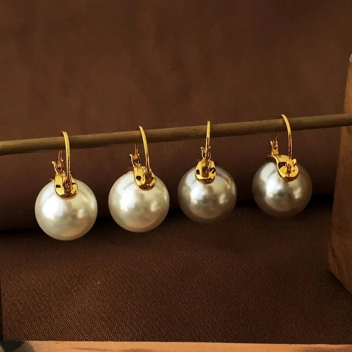 Wholesale Copper plated genuine gold retro temperament pearl earrings elegant lady earrings simple and fashionable earrings
