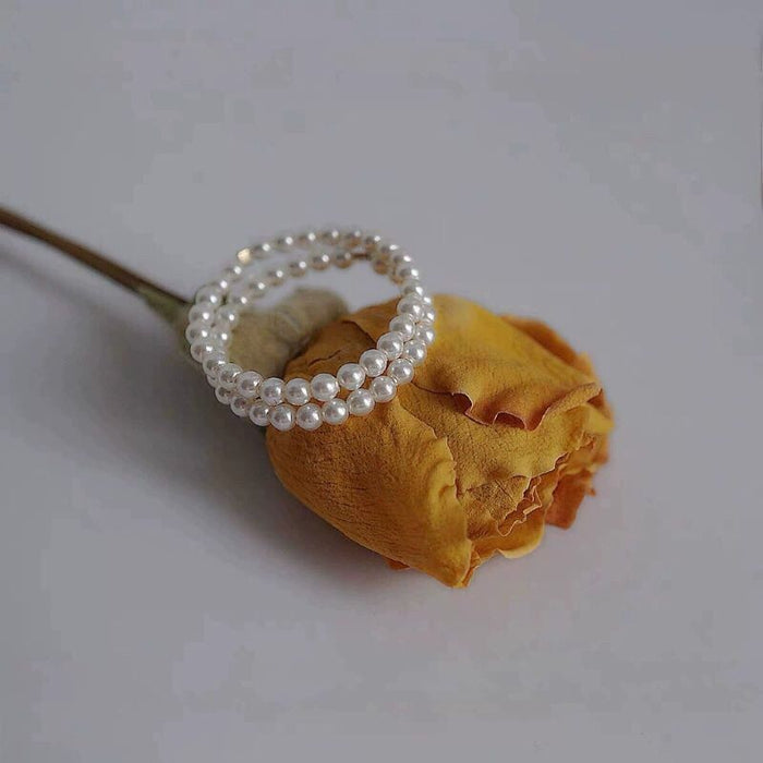 Wholesale Pearl ring for women, niche design, fashionable personality, high-end feel, ring with bead beads and plain circles