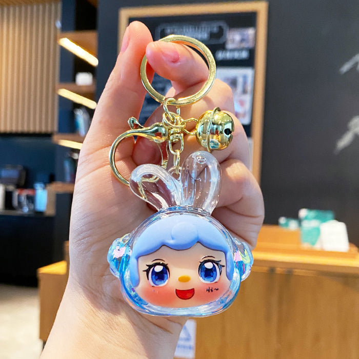 Wholesale Oil-flow sand earphone rabbit keychain