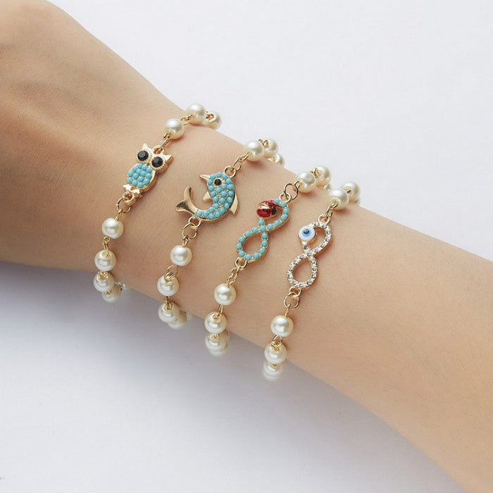 Wholesale Cross 8-shaped Round Hollow Rhinestone Pearl Bracelet JDC-BT-Chuya001