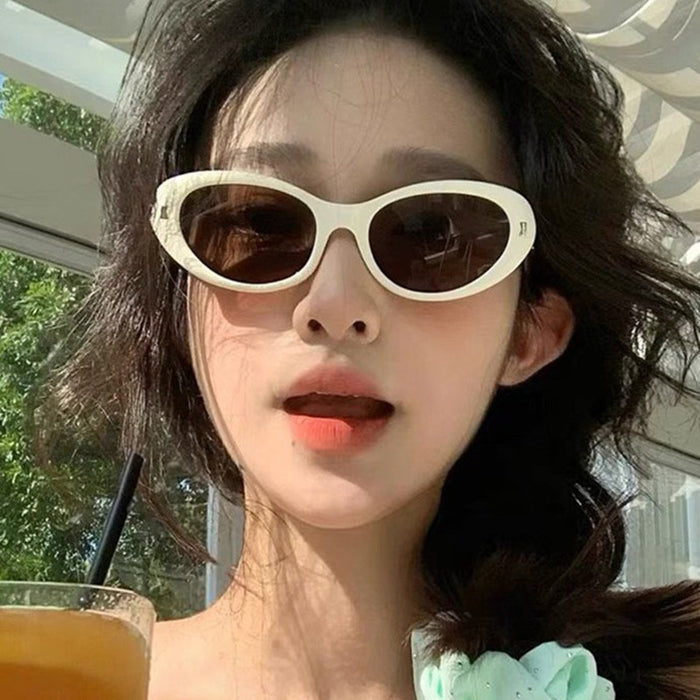 Wholesale Elliptical rice nail cat eye sunglasses, internet famous sunglasses, high-end street photography, UV resistant sunglasses