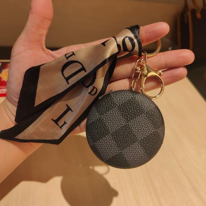 Wholesale light luxury and exquisite presbyopic leather cosmetic mirror key chain pendant double-sided mirror bag pendant JDC-KC-JiYou007