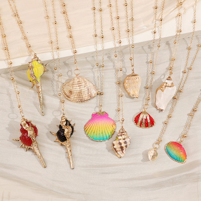 Wholesale Gold edged conch and seashell necklace