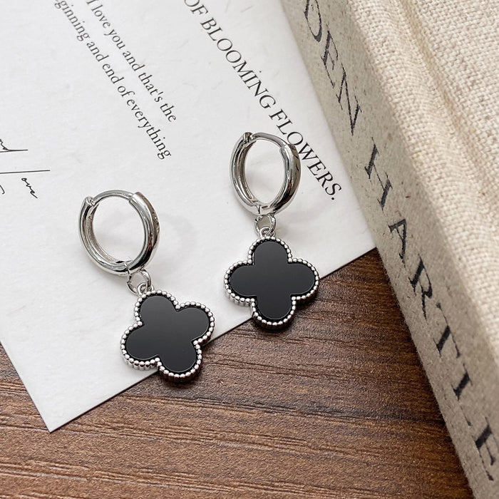 Wholesale Simple lucky flower gold plated earrings