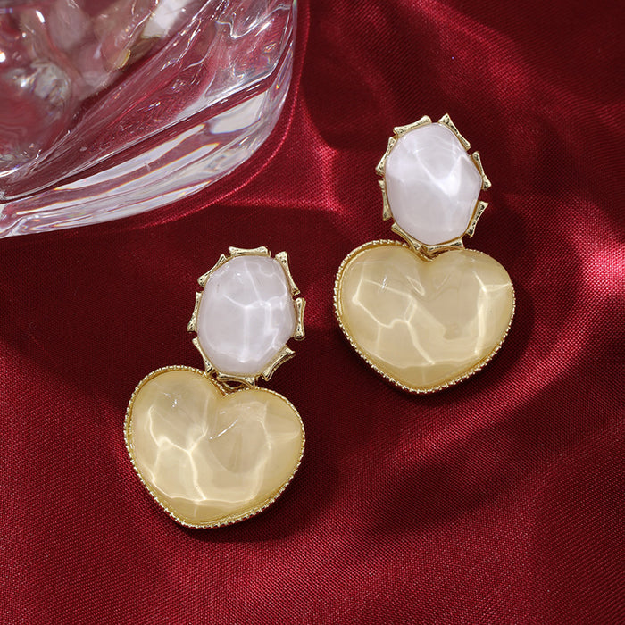 Wholesale Blue contrasting water ripple heart design earrings