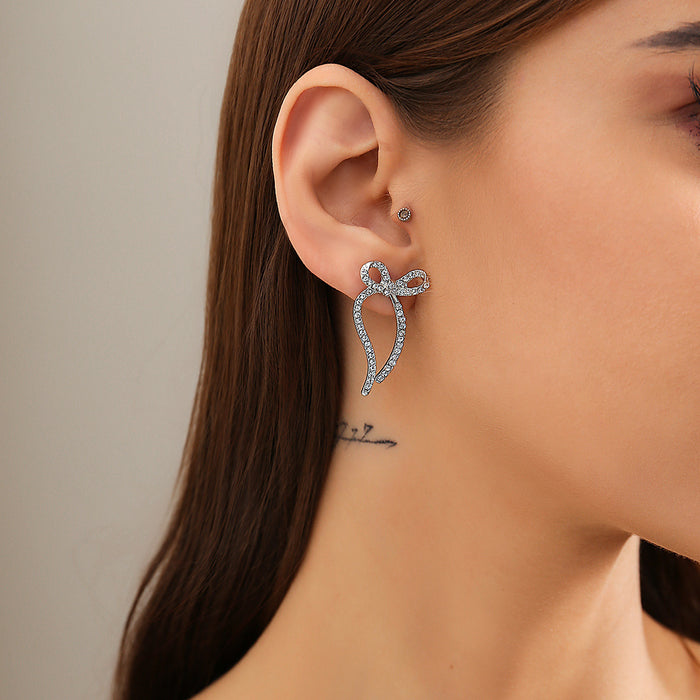 Wholesale Butterfly knot earrings, niche metal ribbon knotted simple earrings