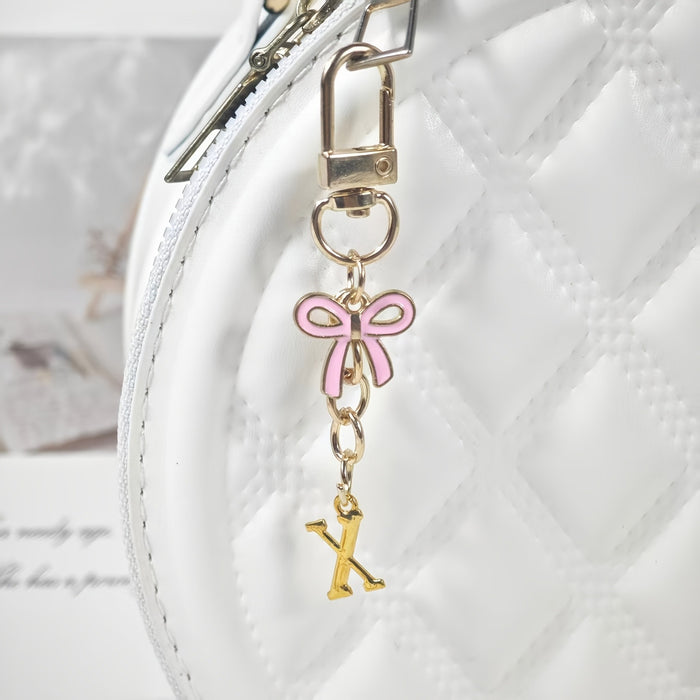 Wholesale Pink bow A-Z keychain alloy accessory