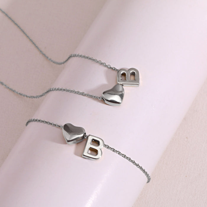Wholesale Clavicle chain jewelry accessory 26 letter heart pendant titanium steel necklace