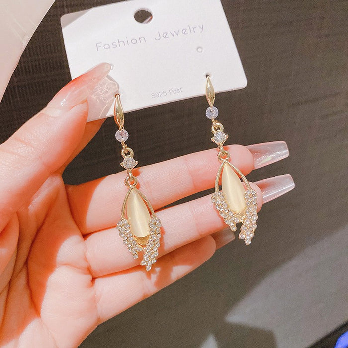 Wholesale New high-end cat eye stone wheat ear leaf earrings with a niche temperament, long style