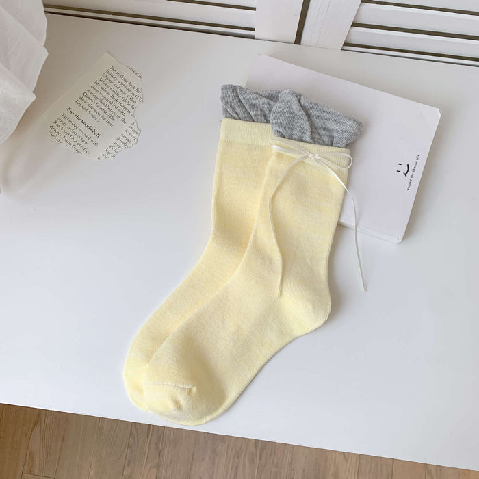 Wholesale Butterfly knot pile socks, cute and versatile pile socks