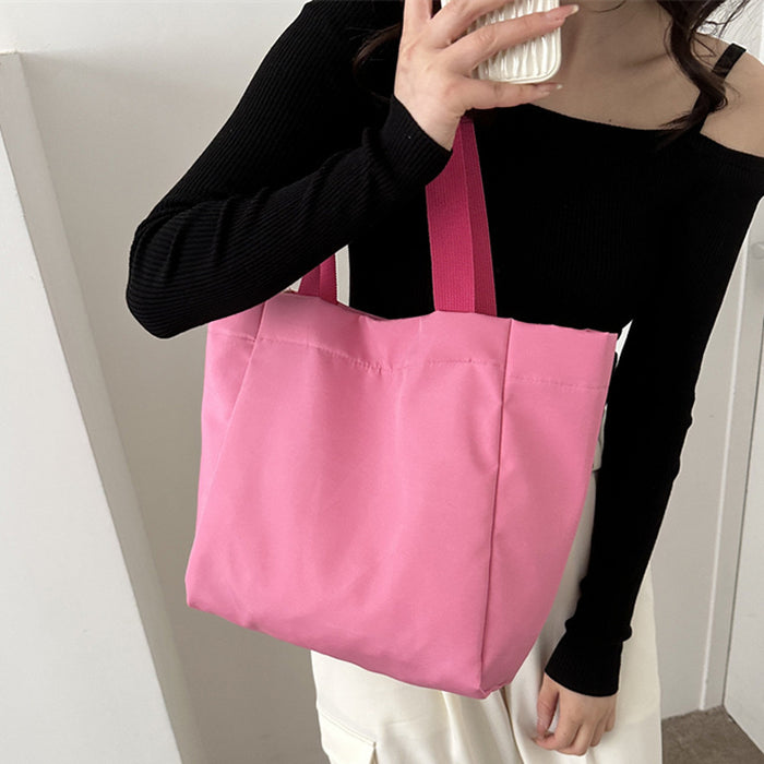 Wholesale Solid color large capacity canvas shoulder bag, simple commuting tote bag, shopping bag