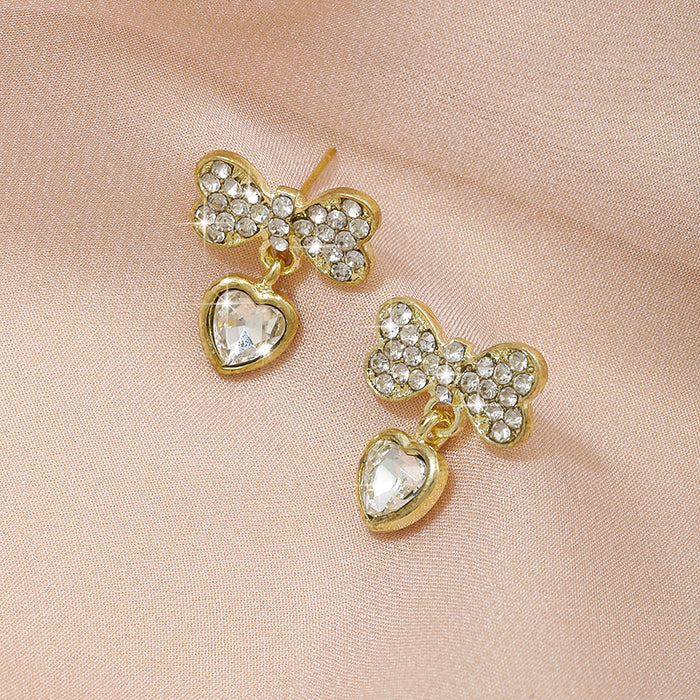Wholesale Fashionable alloy personalized bow, zircon heart earrings, simple earrings, silver needle earrings