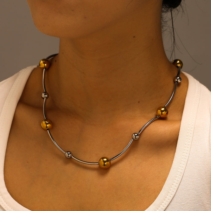 Wholesale Original design: Full body stainless steel gold and silver dual color necklace with a light luxury and high-end feel. Large ball color blocked necklace