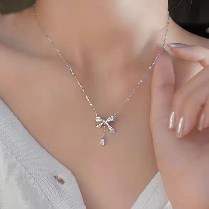 Wholesale Titanium steel necklace bow temperament versatile light luxury tassel collarbone chain accessory