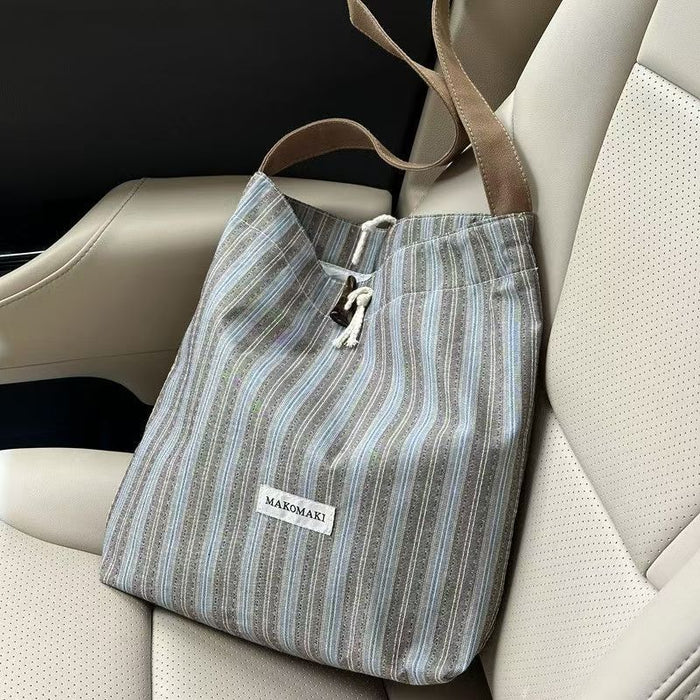 Wholesale Single shoulder commuting bag, new versatile striped large capacity tote bucket bag