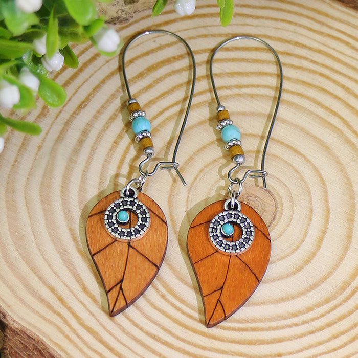 Wholesale Exquisite earrings inlaid with turquoise, women's retro alloy bells, versatile and beautiful earrings