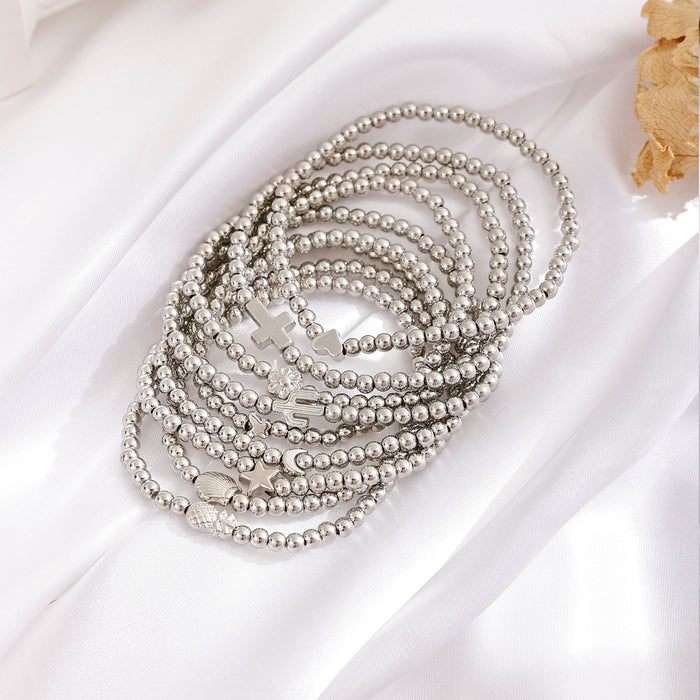 Wholesale Fashionable and minimalist bead string personalized cross flower gold bean bracelet