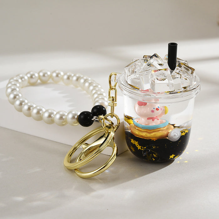 Wholesale Oil-Filled Black Gold Quicksand Piggy Liquid Keychain
