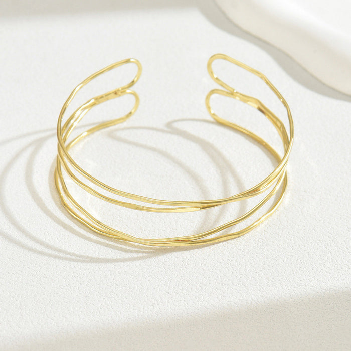 Wholesale New hollowed out multi-layer cross shaped wristband for women, adjustable armband opening, three-dimensional simple and light luxury bracelet