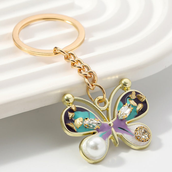 Wholesale Alloy Inlaid Diamond Pearl Butterfly Keychain JDC-KC-RongRui066